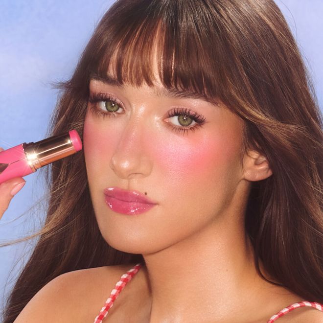 CHARLOTTE TILBURY Кремовые румяна в стике Unreal Blush Healthy Glow Stick, Pinky Glow